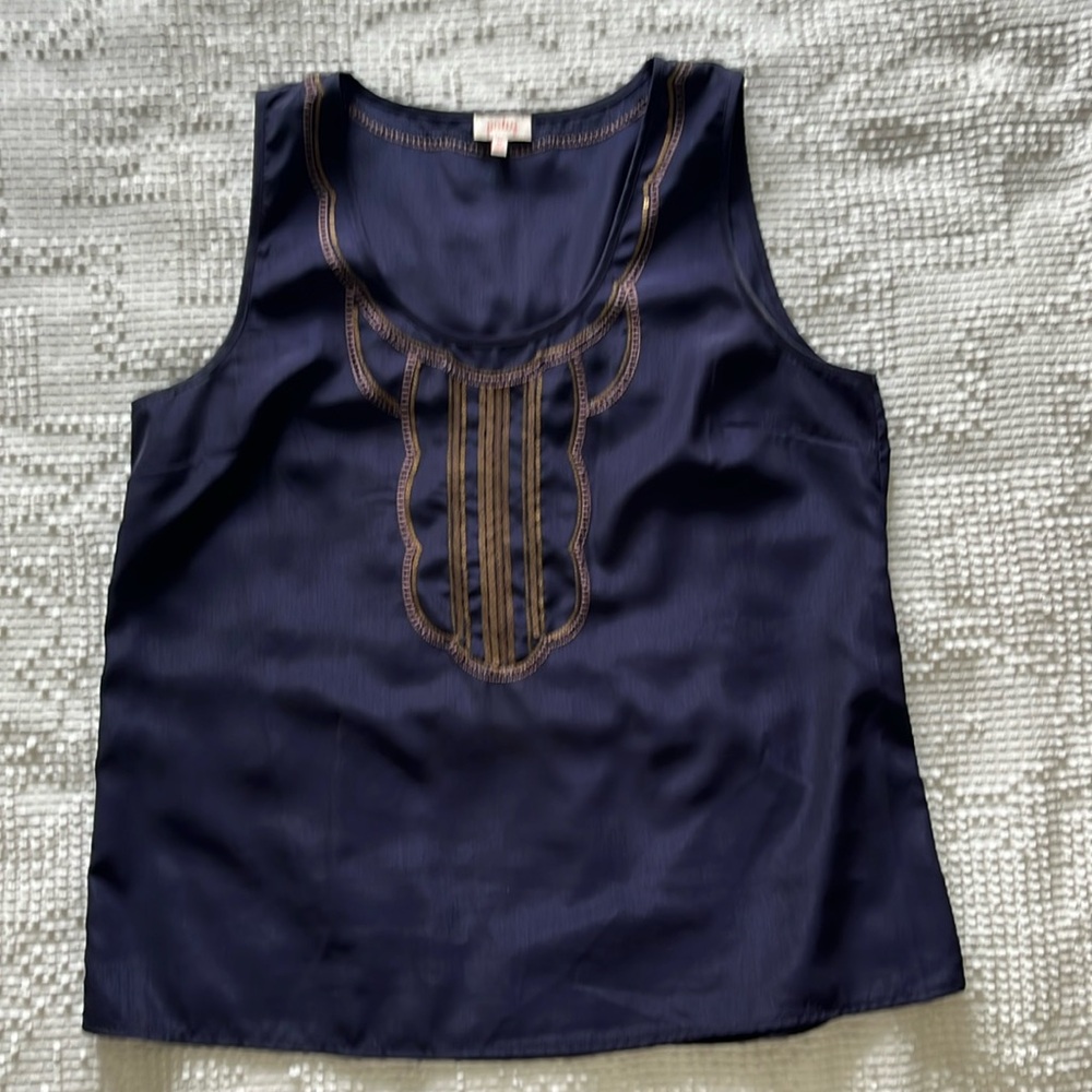 Woman’s tank size Medium.